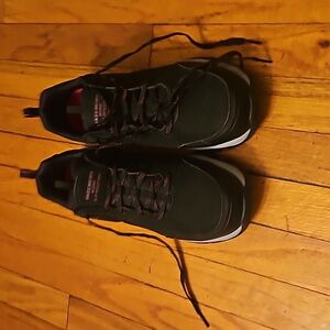 Slightly used Size 8.5 women's sketchers steel toe sneakers black